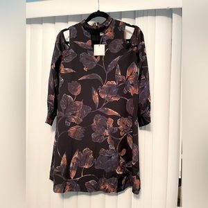 NWT-Everly cold shoulder dress with cut out front. Black floral design size med